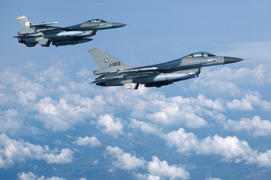 FILE PHOTO: Netherlands' Air Force F-16 fighter jets fly during a media day